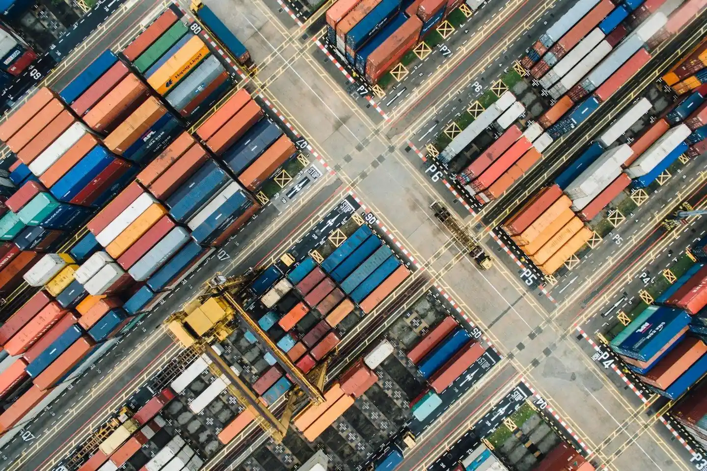 Shipping containers stacked at a freight terminal